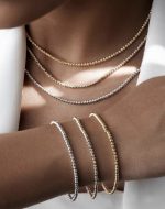 ست گردنبند و‌دستبند طلا زنانه و‌مردانه تمام‌گوی - تصویر 3